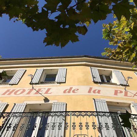 Bar Hotel De La Place Mezel Exterior foto